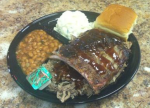 Four bone baby back rib two meat combo with baked beans and coleslaw